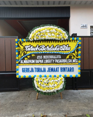 Papan Bunga Duka di Satria